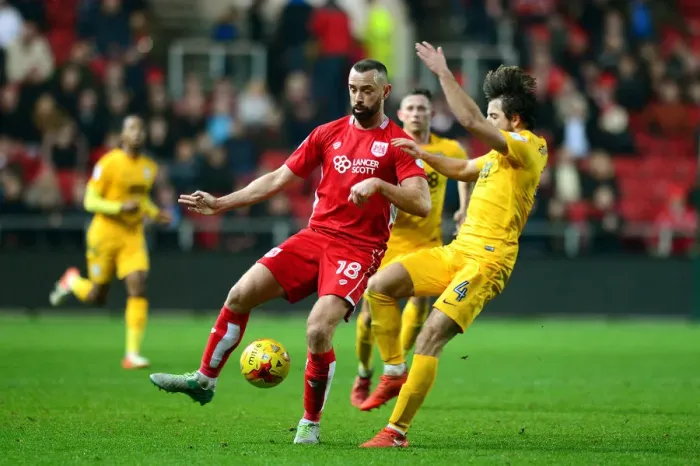 Framed Print : Intense Battle: Wilbraham Under Pressure in Bristol City vs Preston North End Framed Print : Intense Battle: Wilbraham Under Pressure in Bristol City vs Preston North End