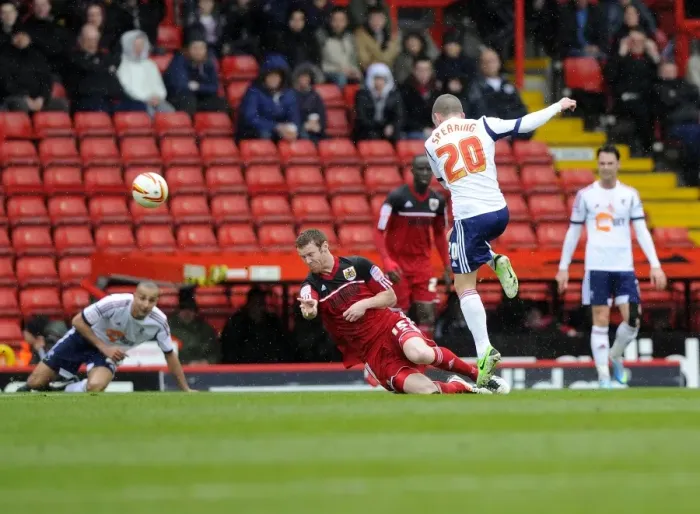 Framed Print : Intense Championship Clash: Pearson Fouls Spearing (Bristol City vs. Bolton Wanderers, 2013)