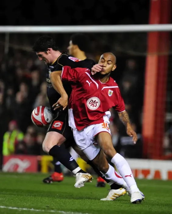 Framed Print : Intense Championship Showdown: Haynes vs Macken's Battle for Possession - Bristol City vs Barnsley (23 / 03 / 2010) Framed Print : Intense Championship Showdown: Haynes vs Macken's Battle for Possession - Bristol City vs Barnsley (23 / 03 / 2010)