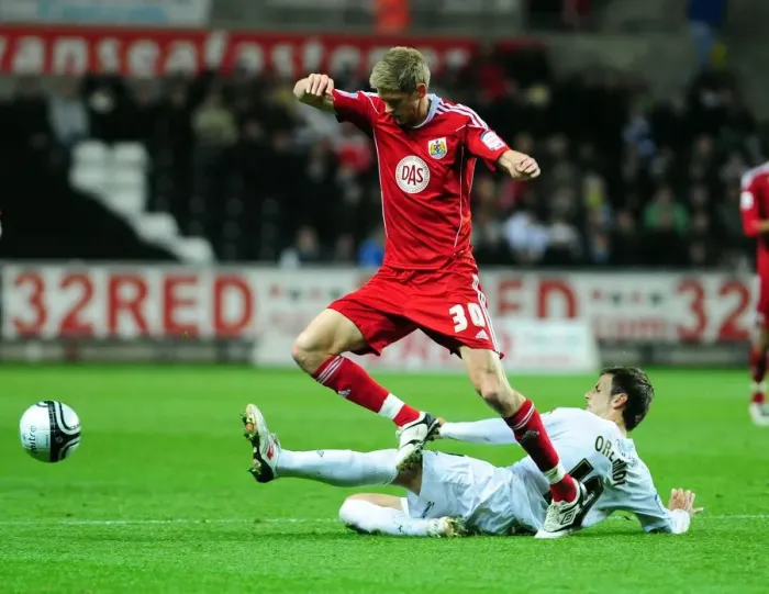 Framed Print : Intense Championship Showdown: Orlandi vs Stead at Swansea's Liberty Stadium (Swansea City vs Bristol City, 10 / 11 / 2010)