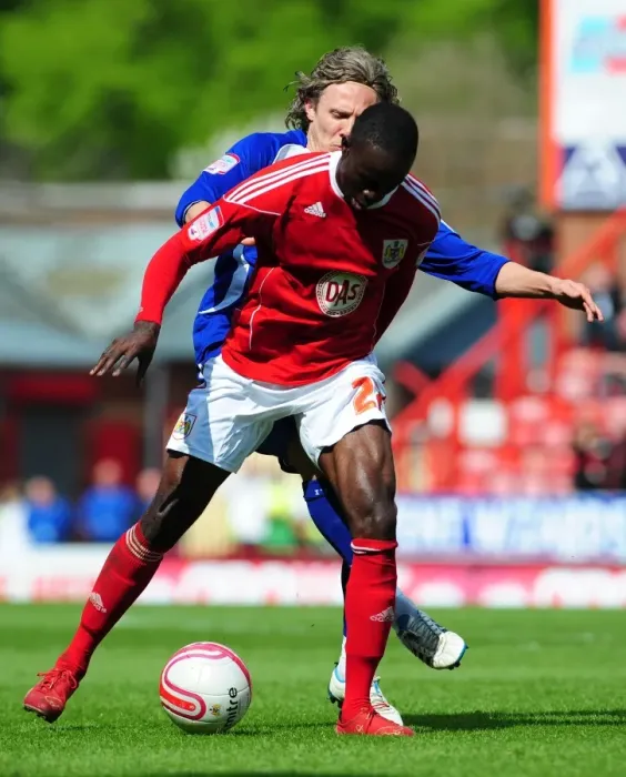 Framed Print : Intense Championship Showdown: Adomah vs. Bullard's Battle for Ball Possession (16-04-2011)