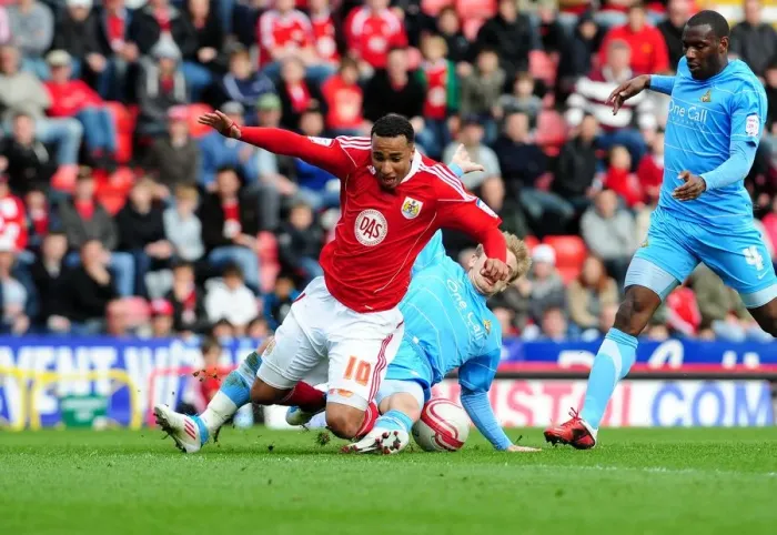 Framed Print : Intense Championship Showdown: Nicky Maynard vs. Joseph Mills, Bristol City vs. Doncaster Rovers, April 2011