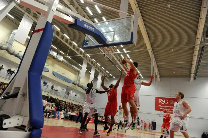 Framed Print : Intense Clash: Bristol Flyers vs. Plymouth Raiders in the British Basketball Cup
