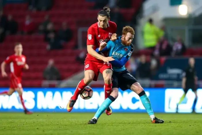 Framed Print : Intense Clash: Milan Djuric vs. Cian Bolger, FA Cup Third Round at Ashton Gate