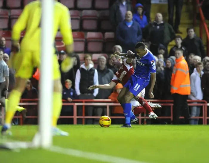 Framed Print : Intense Clash: Wagstaff vs Montano in Sky Bet League One - Bristol City vs Oldham Athletic Framed Print : Intense Clash: Wagstaff vs Montano in Sky Bet League One - Bristol City vs Oldham Athletic