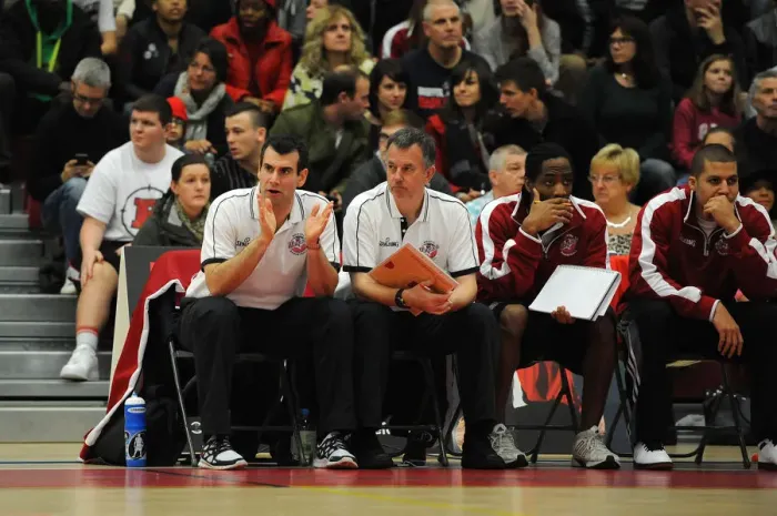 Framed Print : Intense Focus: Coach Kapoulas Leads the Way for Bristol Flyers in Basketball Showdown