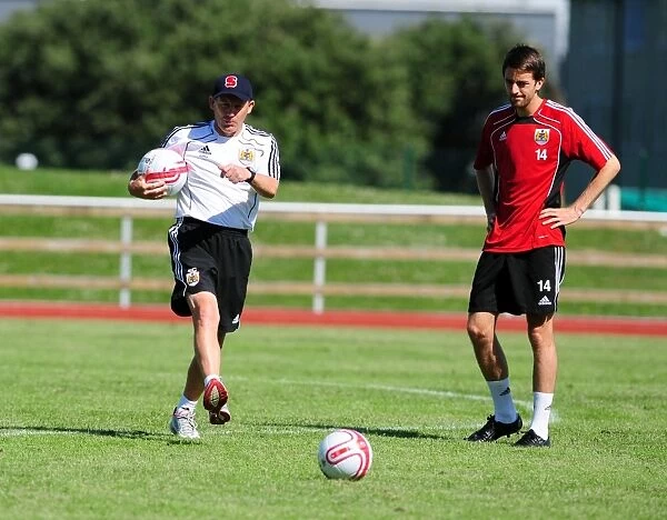Intense Focus: McAllister and Clarkson in Deep Concentration at Bristol City Football Club Training Ground