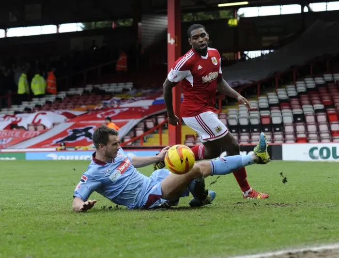 Framed Print : Intense Football Action: Bristol City vs Tranmere Rovers Clash in Sky Bet League One at Ashton Gate