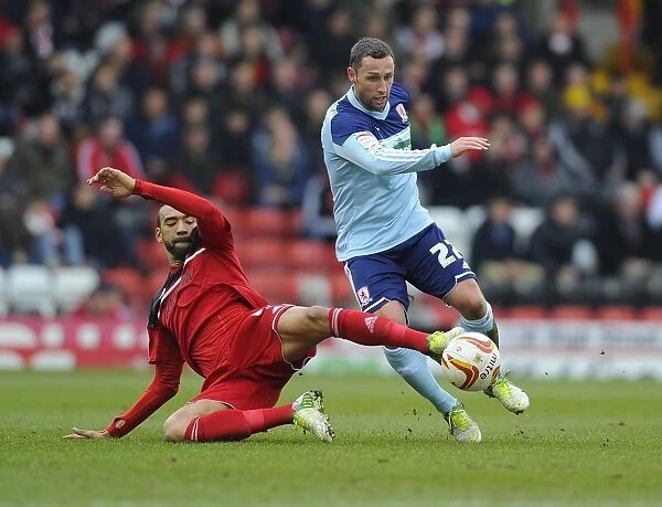 Intense Football Clash: Liam Fontaine Tackles Scott McDonald, Bristol City vs. Middlesbrough