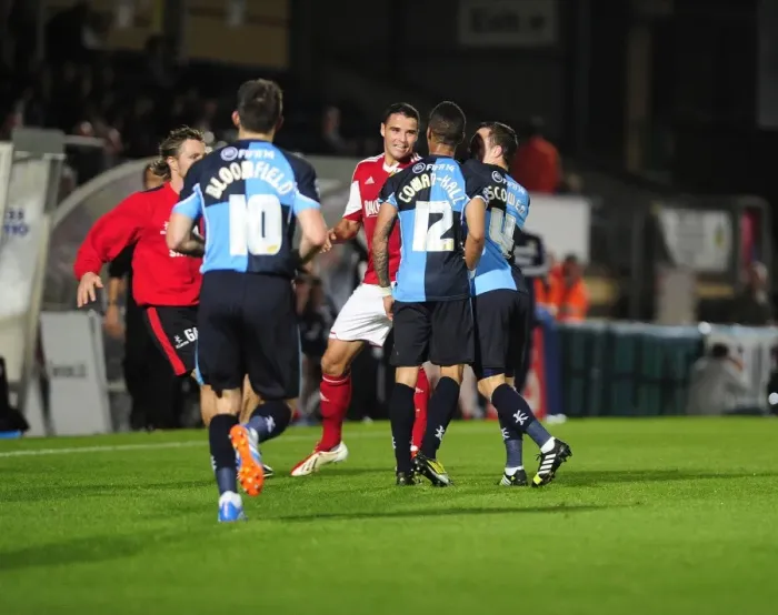 Framed Print : Intense Football Rivalry: Bristol City vs Wycombe Wanderers in the Johnstone's Paint Trophy Clash at Adams Park (2013)