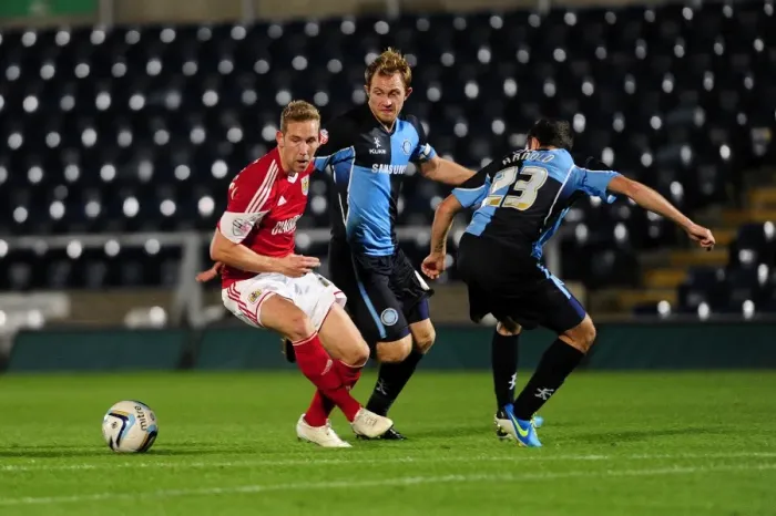 Framed Print : Intense Football Rivalry: Bristol City vs Wycombe Wanderers at Adams Park - October 8, 2013 Framed Print : Intense Football Rivalry: Bristol City vs Wycombe Wanderers at Adams Park - October 8, 2013