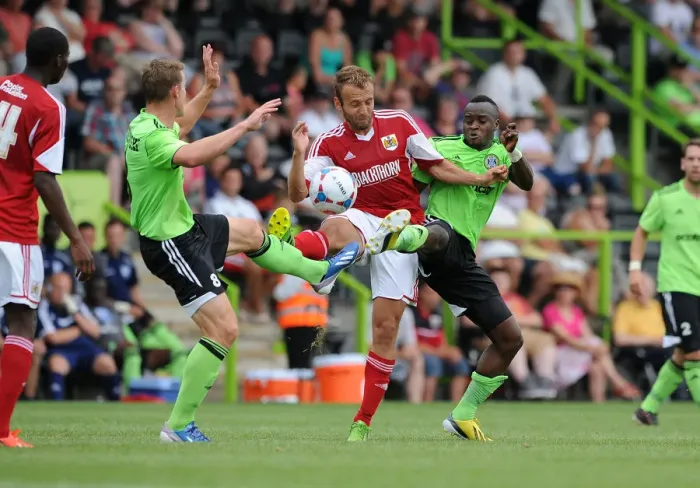 Framed Print : Intense Football Rivalry: Liam Kelly vs. Yan Klukowski and Alhassan Bangura - Forest Green Rovers vs. Bristol City Framed Print : Intense Football Rivalry: Liam Kelly vs. Yan Klukowski and Alhassan Bangura - Forest Green Rovers vs. Bristol City