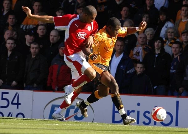 Intense Football Rivalry: Marvin Elliott vs. Wolverhampton Wanderers - Battle for Possession