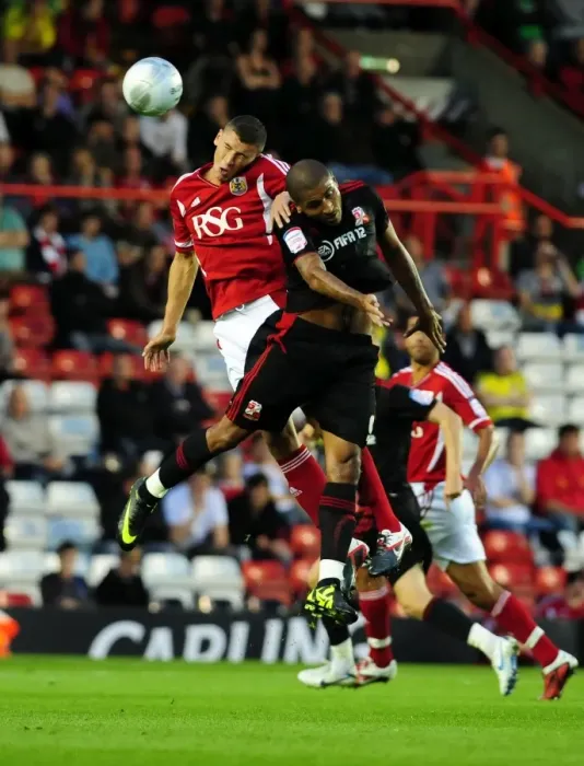 Framed Print : Intense League Cup Clash: James Wilson vs Leon Clarke at Ashton Gate Stadium (August 2011) - Bristol City vs Swindon Town Framed Print : Intense League Cup Clash: James Wilson vs Leon Clarke at Ashton Gate Stadium (August 2011) - Bristol City vs Swindon Town