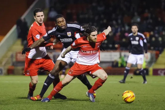 Framed Print : Intense Midfield Battle: Jay Emmanuel-Thomas vs. Romain Vincelot in Leyton Orient vs. Bristol City Football Rivalry Framed Print : Intense Midfield Battle: Jay Emmanuel-Thomas vs. Romain Vincelot in Leyton Orient vs. Bristol City Football Rivalry