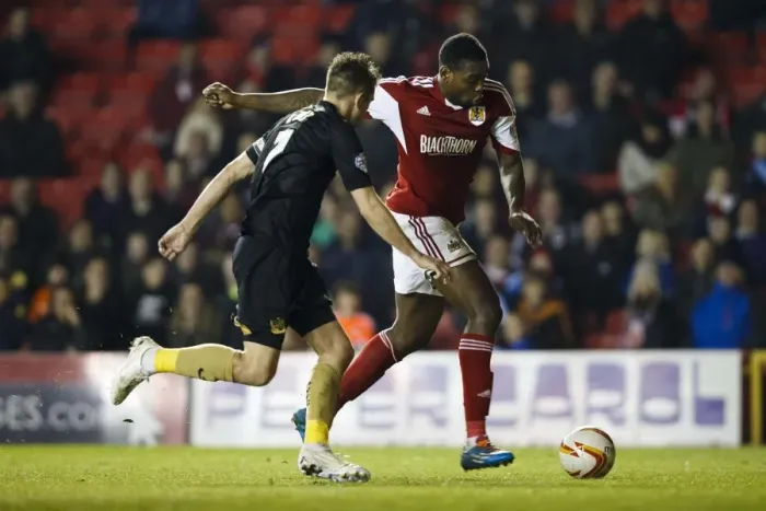 Framed Print : Intense Midfield Battle: Jay Emmanuel-Thomas vs Doug Loft, Bristol City vs Port Vale Framed Print : Intense Midfield Battle: Jay Emmanuel-Thomas vs Doug Loft, Bristol City vs Port Vale