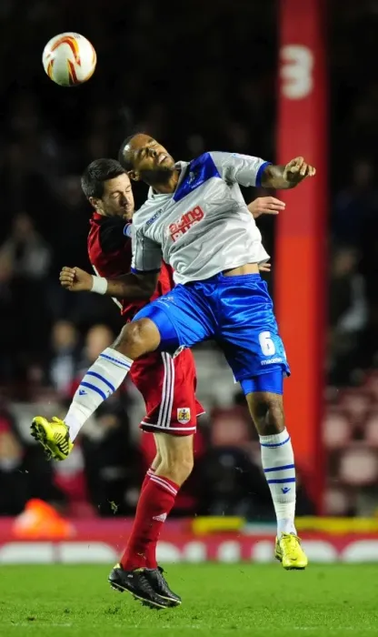 Framed Print : Intense Moment: Cole Skuse vs. Liam Trotter - A Head-to-Head Battle in Bristol City vs. Millwall Championship Match