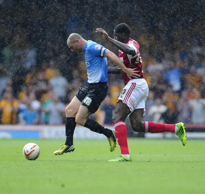 Framed Print : Intense Moment: Jay Emmanuel-Thomas Chases Down Gary Jones during Bristol City vs Bradford City Football Match Framed Print : Intense Moment: Jay Emmanuel-Thomas Chases Down Gary Jones during Bristol City vs Bradford City Football Match