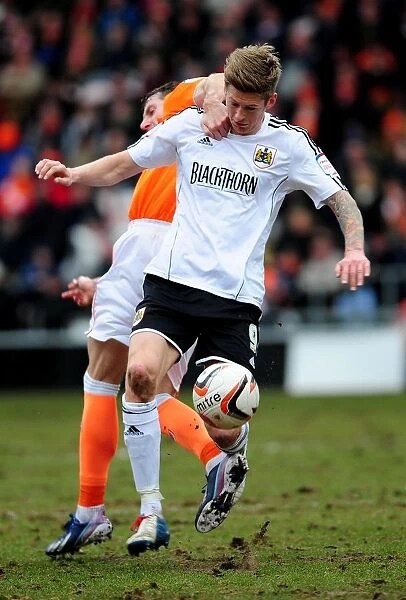 Intense Moment: Jon Stead vs Kirk Broadfoot Clash in Bristol City vs Blackpool Npower Championship Match, 2013