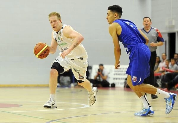 Intense Moment: Josh Wilcher Drives Forward in Bristol Flyers vs. Plymouth Raiders Basketball Game