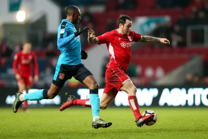 Framed Print : Intense Moment: Lee Tomlin vs Amari Bell - FA Cup Clash at Ashton Gate