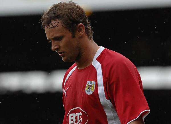 Intense Moment: Lee Trundle Focuses on the Ball Amidst the Chaos of Bristol City vs Preston North End