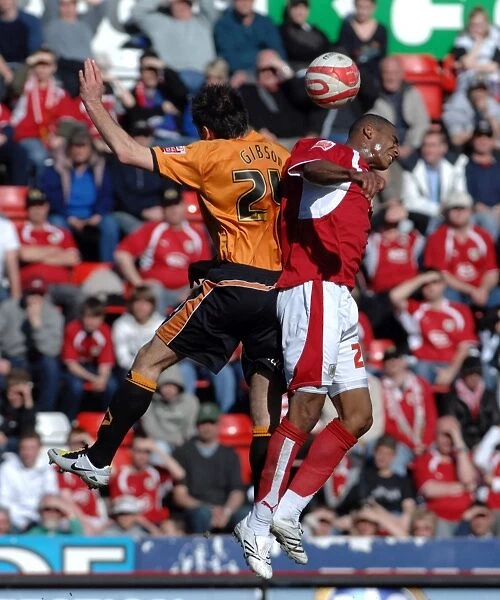 Intense Moment: Marvin Elliott Fights for Possession against Wolverhampton Wanderers (Bristol City FC)
