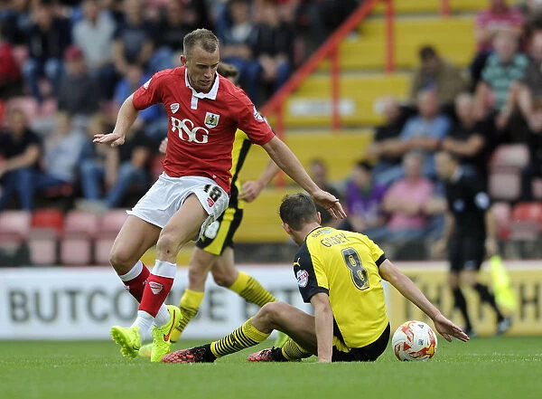 Intense Moment: Wilbraham Chases Down Gilbey in Bristol City vs Colchester United