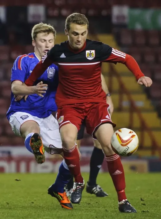 Framed Print : Intense Moment: Young Star Cline's Battle in FA Youth Cup Third Round Proper at Ashton Gate Stadium