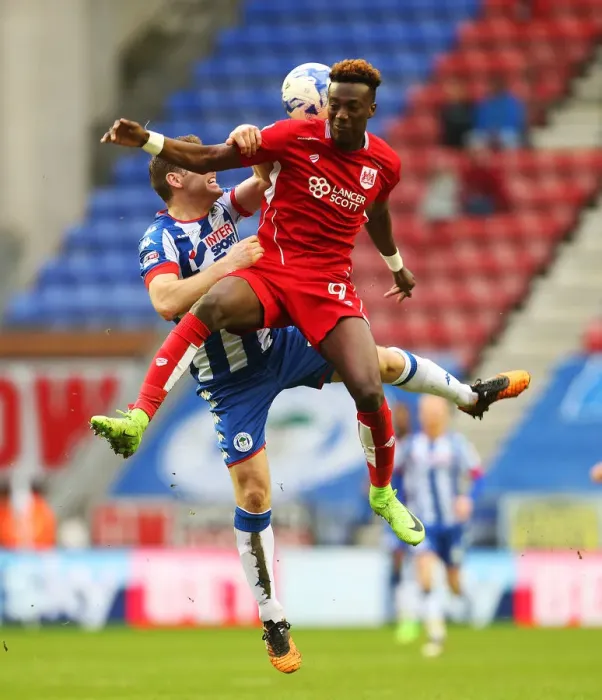 Framed Print : Intense Rivalry: Abraham vs Buxton at DW Stadium - Wigan Athletic vs Bristol City, Sky Bet Championship