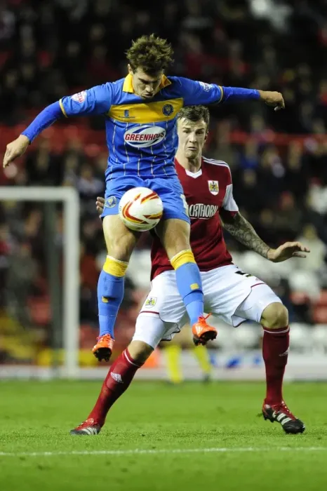Framed Print : Intense Rivalry: Aden Flint vs Tom Bradshaw - Football Showdown at Ashton Gate Framed Print : Intense Rivalry: Aden Flint vs Tom Bradshaw - Football Showdown at Ashton Gate