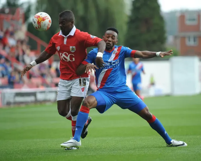 Framed Print : Intense Rivalry: Agard and Bennett Clash in Bristol City vs Doncaster Rovers Football Match, September 2014