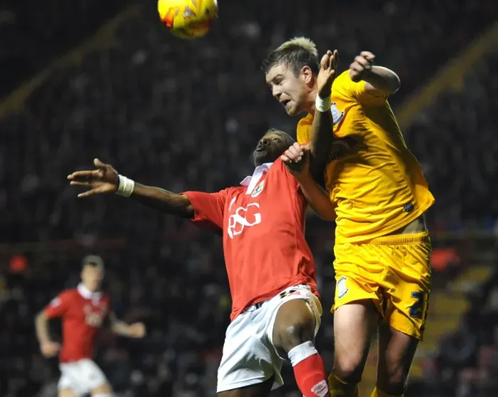 Framed Print : Intense Rivalry: Agard vs Hugill Clash at Ashton Gate - Football Showdown between Bristol City's Kieran Agard and Preston North End's Jordan Hugill