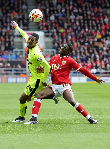 Intense Rivalry: Agard vs van La Parra Fight for Ball Control, Bristol City vs Huddersfield Town