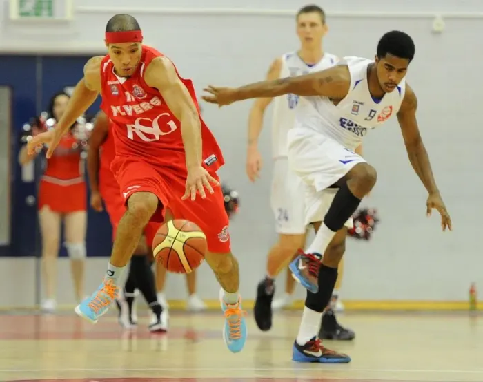 Framed Print : Intense Rivalry on the Basketball Court: Flyers vs. Surrey United