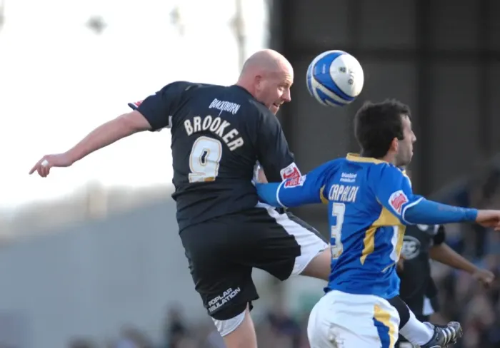 Framed Print : The Intense Rivalry: Brooker in Action - Cardiff City vs. Bristol City Football Match