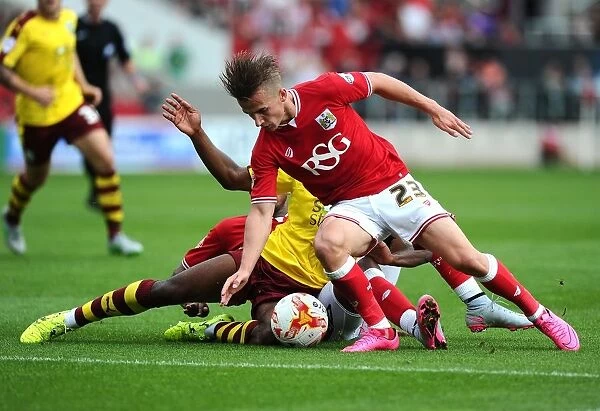 Intense Rivalry: Bryan vs Darikwa - Battle for Possession in Bristol City vs Burnley