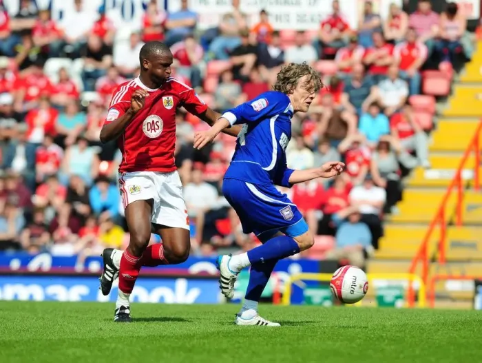 Framed Print : Intense Rivalry: Cisse vs Bullard Clash in the Championship Battle between Bristol City and Ipswich Town, April 2011 Framed Print : Intense Rivalry: Cisse vs Bullard Clash in the Championship Battle between Bristol City and Ipswich Town, April 2011