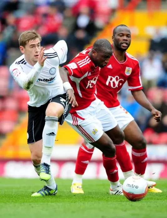 Framed Print : Intense Rivalry: Cisse vs. Davies Clash in Bristol City vs. Derby County Football Match Framed Print : Intense Rivalry: Cisse vs. Davies Clash in Bristol City vs. Derby County Football Match