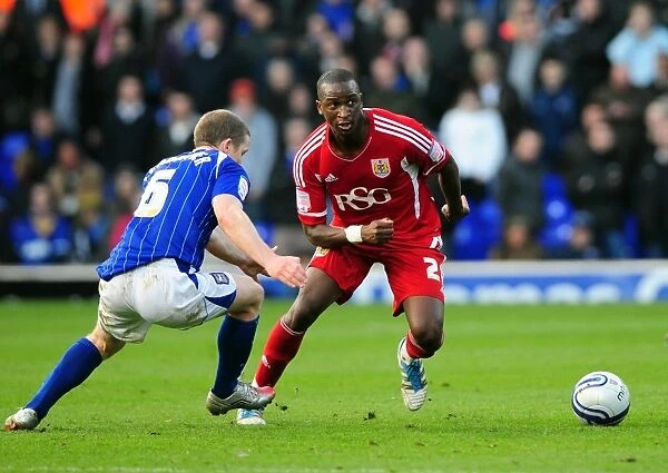Intense Rivalry: Cisse vs Leadbitter in the Heart of the Football Battle at Portman Road, 2012