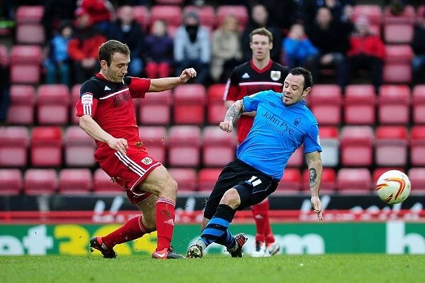 Intense Rivalry: A Clash Between Liam Kelly and Andy Reid in Bristol City vs. Nottingham Forest Football Match