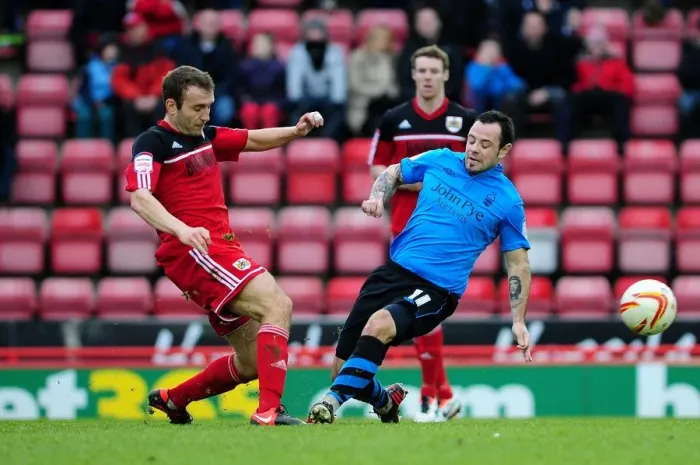 Framed Print : Intense Rivalry: A Clash Between Liam Kelly and Andy Reid in Bristol City vs. Nottingham Forest Football Match Framed Print : Intense Rivalry: A Clash Between Liam Kelly and Andy Reid in Bristol City vs. Nottingham Forest Football Match