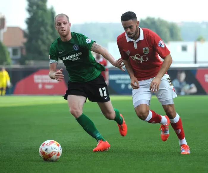 Framed Print : Intense Rivalry: Derrick Williams vs Neil Bishop - A Football Battle at Ashton Gate Framed Print : Intense Rivalry: Derrick Williams vs Neil Bishop - A Football Battle at Ashton Gate
