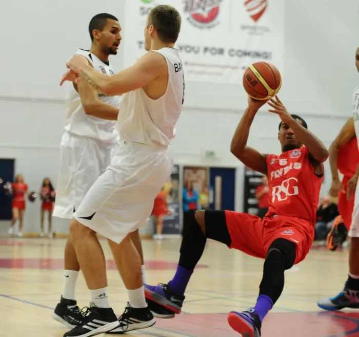Framed Print : Intense Rivalry: Flyers vs. Giants Basketball Showdown at SGS Wise Campus (December 2014) - Dwayne Lautier-Ogunleye in Action
