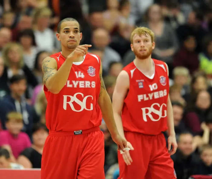 Framed Print : Intense Rivalry: Flyers vs. Raiders in British Basketball Cup at Wise Campus