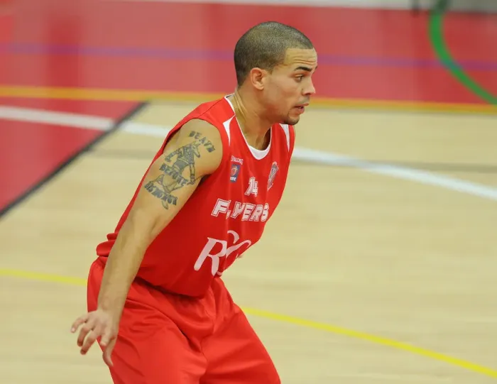 Framed Print : Intense Rivalry: Flyers vs. Raiders in British Basketball Cup at Wise Campus