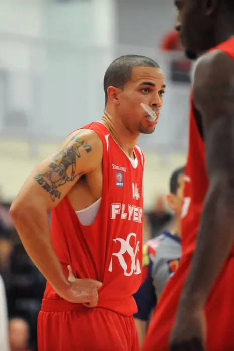 Framed Print : Intense Rivalry: Flyers vs. Raiders in British Basketball Cup at Wise Campus