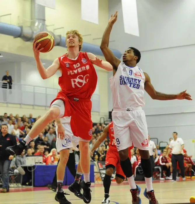 Framed Print : Intense Rivalry: Flyers vs. United Basketball Showdown at SGS Wise Campus (November 2014)