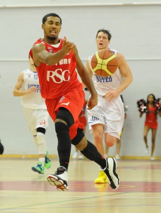 Framed Print : Intense Rivalry: Flyers vs. United Basketball Showdown at SGS Wise Campus (November 2014)