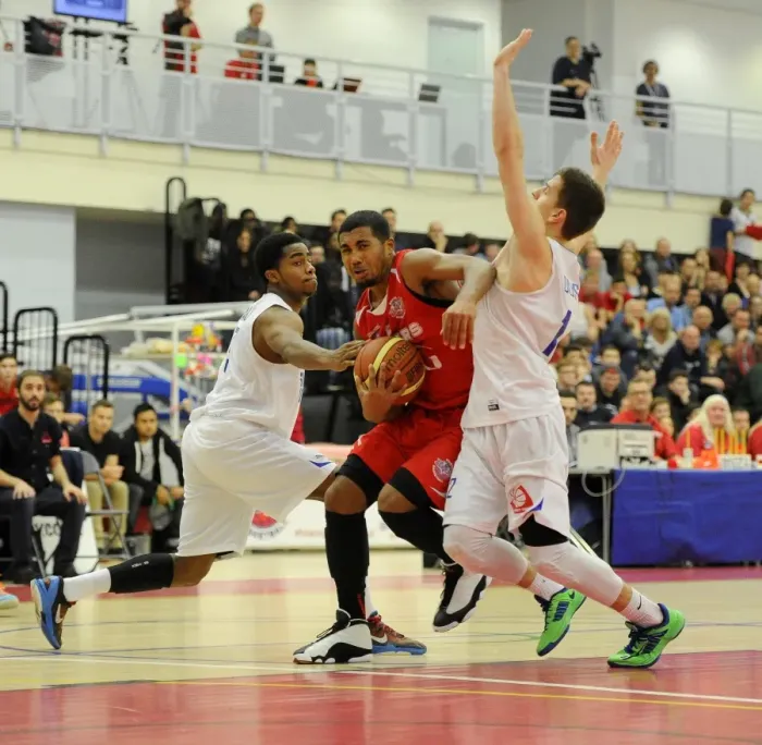 Framed Print : Intense Rivalry: Flyers vs. United Basketball Showdown at SGS Wise Campus (November 2014)